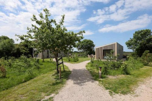 Κήπος έξω από το Hello Zeeland - Tiny House Zeeuwse Liefde 11