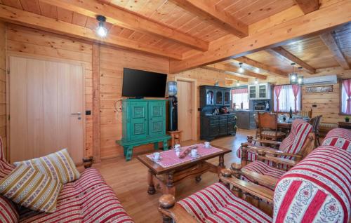 a living room with furniture and a television in a cabin at Villa Luna - Ludbreg by Villas Guide in Ludbreg