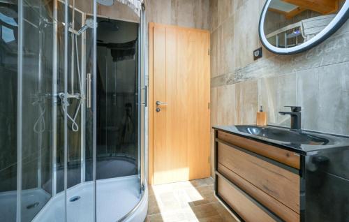 a bathroom with a shower and a sink and a tub at Villa Luna - Ludbreg by Villas Guide in Ludbreg