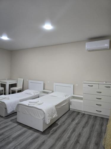 Postel nebo postele na pokoji v ubytování Guesthouse Hillview