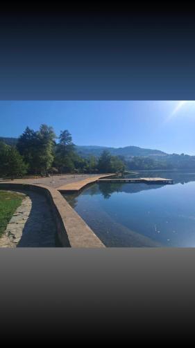 a view of a body of water with a beach at Paulinio in Jajce