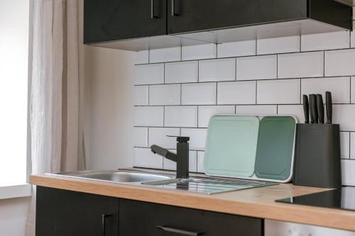 Η κουζίνα ή μικρή κουζίνα στο Bright Stylish Apartment Near Beach - Appa Ostend