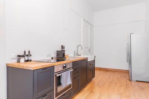 Una cocina o cocineta en Alpena Homes, Zentrum, Domblick, Küche