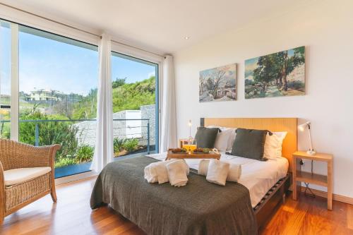 En eller flere senge i et værelse på Cape View Villa by Atlantic Holiday