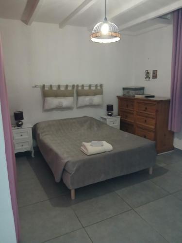 Postel nebo postele na pokoji v ubytování Jolie maison