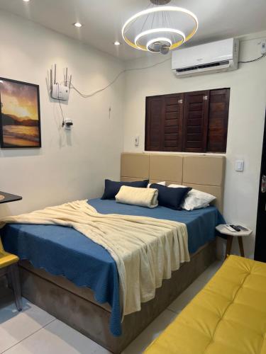 Ένα ή περισσότερα κρεβάτια σε δωμάτιο στο Casa Amarela em Pipa apenas 3 min caminhada ate a praia