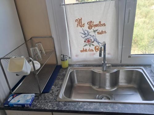 Appartement Platamonにあるキッチンまたは簡易キッチン
