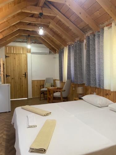 Ένα ή περισσότερα κρεβάτια σε δωμάτιο στο Guesthouse Vila ERI