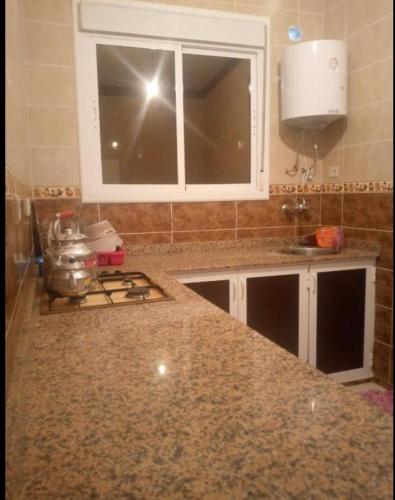 Hoceima climatiséにあるキッチンまたは簡易キッチン