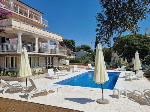 Πισίνα στο ή κοντά στο Rooms Vida in Center Novalja With Pool