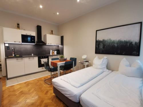 Η κουζίνα ή μικρή κουζίνα στο Wien West Home