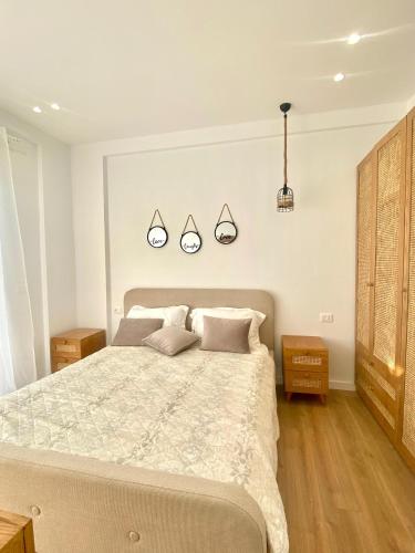 Ένα ή περισσότερα κρεβάτια σε δωμάτιο στο Boho Mar Drymadhes by PS