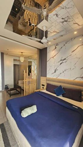 Ένα ή περισσότερα κρεβάτια σε δωμάτιο στο Skyline studio Noida