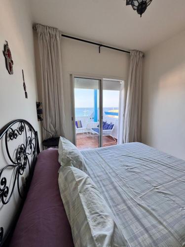 Ένα ή περισσότερα κρεβάτια σε δωμάτιο στο Alcudia Smir - Vistas al Mar