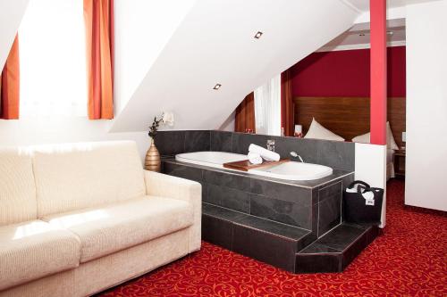 Posezení v ubytování Hotel Gramaser