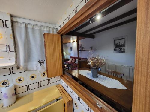 a kitchen with a counter top in a room at Apto De Montaña En Puigcerdà in Puigcerdà