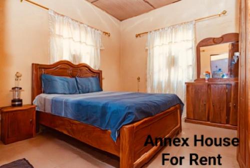 Postel nebo postele na pokoji v ubytování Annex House For Rent
