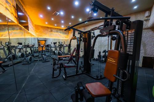 a gym with many exercise bikes in a room at Utopia Cave Cappadocia in Urgup