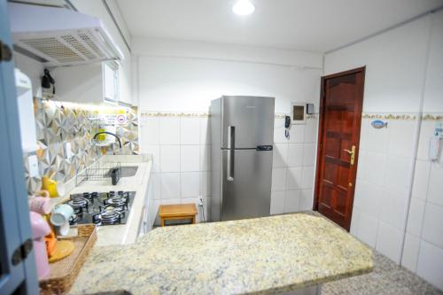 Kuchyň nebo kuchyňský kout v ubytování Apê Maravilha de Itaúna a 100 metros da praia mais famosa da cidade, com todo conforto que você merece!