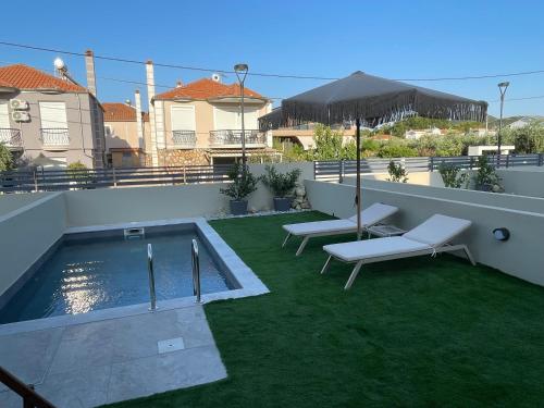 Bazén v ubytování Trinity Pool Villas WHITE nebo v jeho okolí