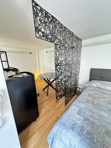 a bedroom with a bed and a table at Florence Sweet Nest in Florence