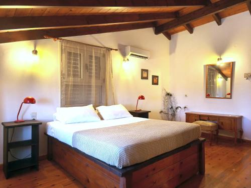 Ένα ή περισσότερα κρεβάτια σε δωμάτιο στο Casa Evriali Apartments