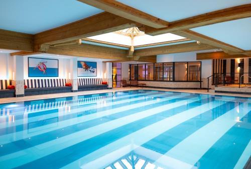 a large swimming pool in a hotel room at Solent Hotel and Spa in Fareham