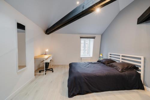 Postel nebo postele na pokoji v ubytování Vaste maison bourgeoise