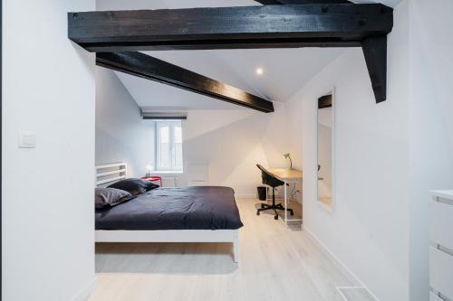 Postel nebo postele na pokoji v ubytování Vaste maison bourgeoise