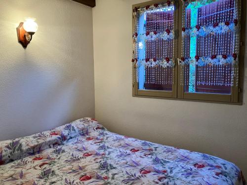 Ένα ή περισσότερα κρεβάτια σε δωμάτιο στο Chalet D-LYS