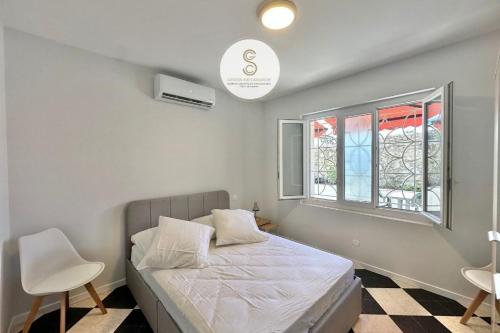 Postel nebo postele na pokoji v ubytování Le Mirage Arles