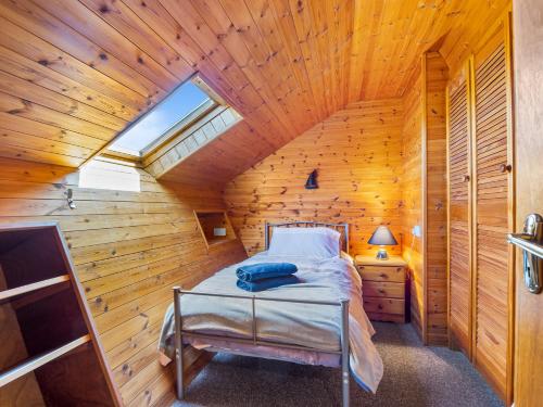 Postel nebo postele na pokoji v ubytování Hughs Cottage