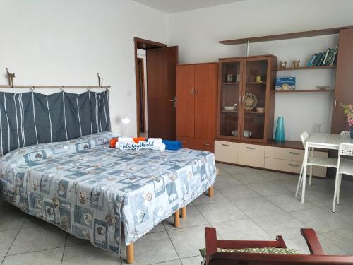 Ένα ή περισσότερα κρεβάτια σε δωμάτιο στο Casa Sole Nascente by Holiday World