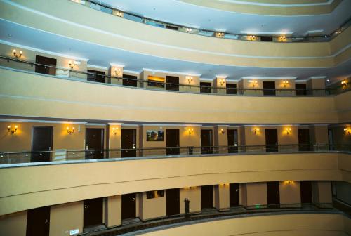 a view of a large building with a balcony at Capital Hotel and Spa in Addis Ababa