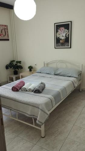 a large bed in a room with at Maraki's house in Kavala