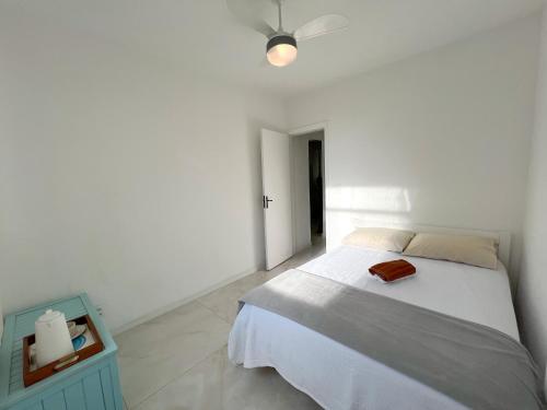 Postel nebo postele na pokoji v ubytování Delicinha, a 300m da Praia do Forte