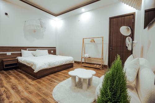 Postel nebo postele na pokoji v ubytování Sam House