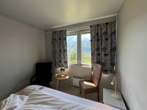 Postel nebo postele na pokoji v ubytování Hallingskarvet Fjellstue as