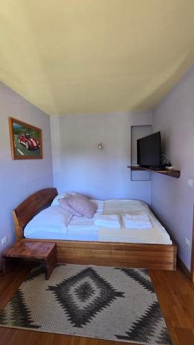 Katil atau katil-katil dalam bilik di Woodland - Apartments & SPA Łagów