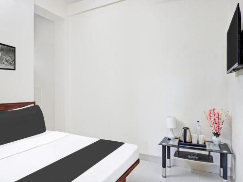 TV a/nebo společenská místnost v ubytování Hotel O Nutan Lodging
