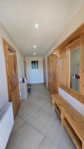 Katil atau katil-katil dalam bilik di Woodland - Apartments & SPA Łagów