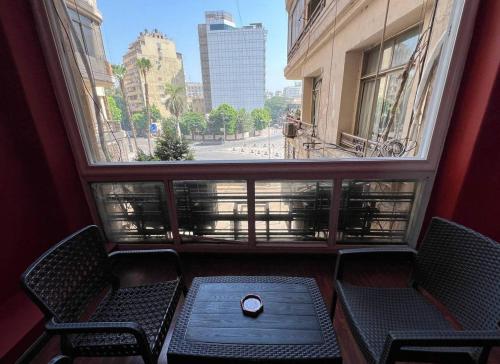 Un balcón o terraza de Arabian Downtown in Tahrir beside US embassy AUC