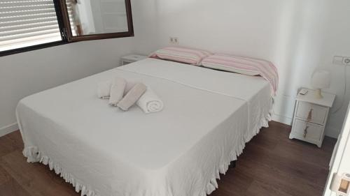 Posteľ alebo postele v izbe v ubytovaní Apartamento en primera línea Javea