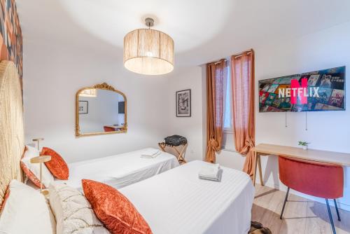 Ένα ή περισσότερα κρεβάτια σε δωμάτιο στο Villa Floréa 4-6p - 2 salles de bain 2ch Parking