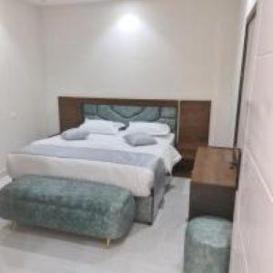 En eller flere senge i et værelse på يمامه الفخامه للشقق الفندقيه