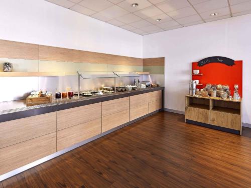 Köök või kööginurk majutusasutuses B&B Hotel Bonn-City