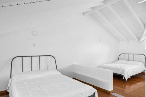 Cama o camas de una habitación en Casa Brisa by Otium