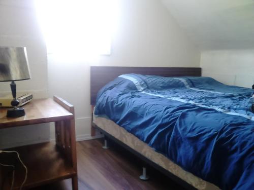 A bed or beds in a room at Canora Vacation Home
