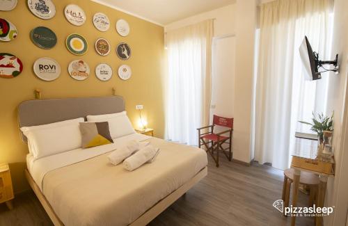 Cama o camas de una habitación en PizzaSleep B&B