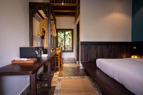 Postel nebo postele na pokoji v ubytování Trang An Ecolodge